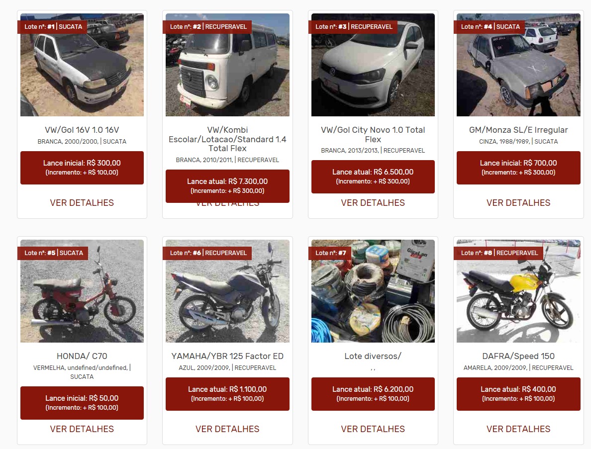  Imagem colorida mostra a tela de site de leilões contendo sete veículos, sendo quatro carros, três motos e um item contendo fiação.