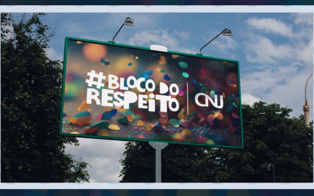 foto colorida de um outdoor escrito #bloco do respeito e o fundo tem confetes carnavalescos 